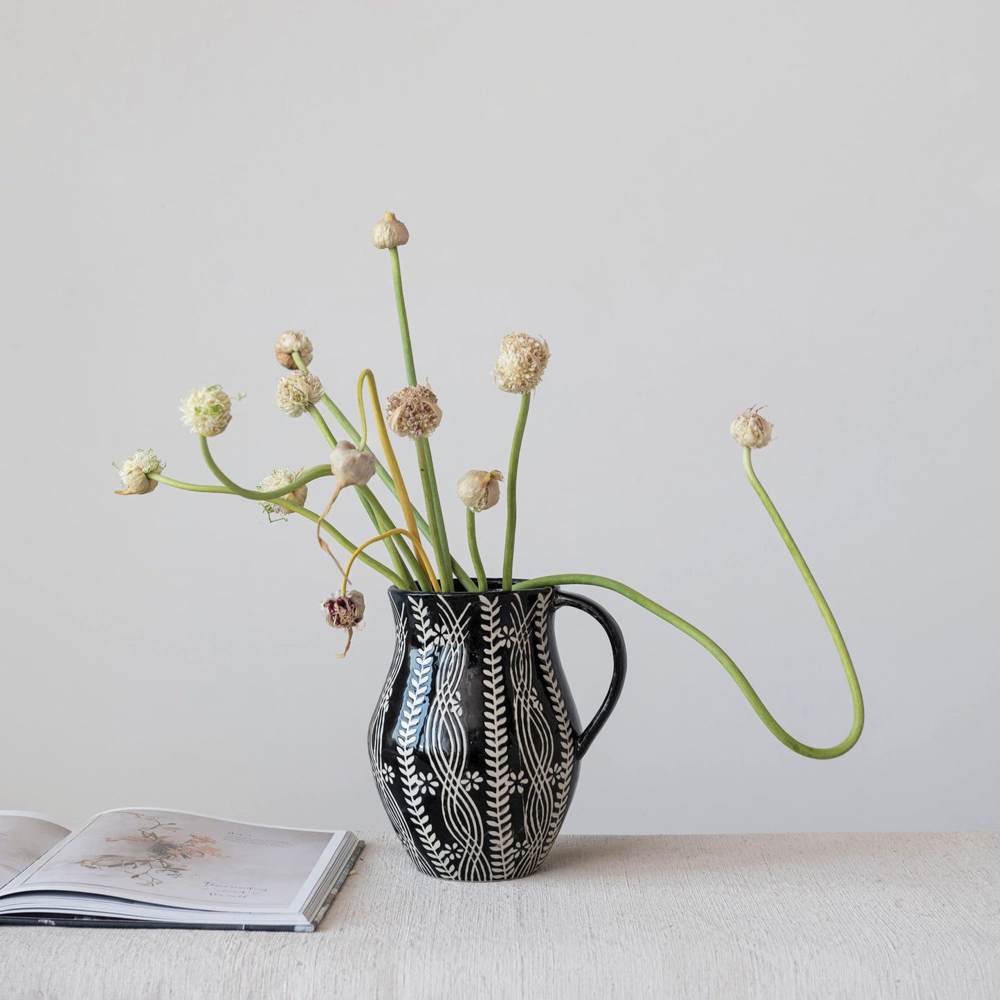 Creative Co-Op Stoneware Wax Relief Botanicals, Black and Natural Pitcher