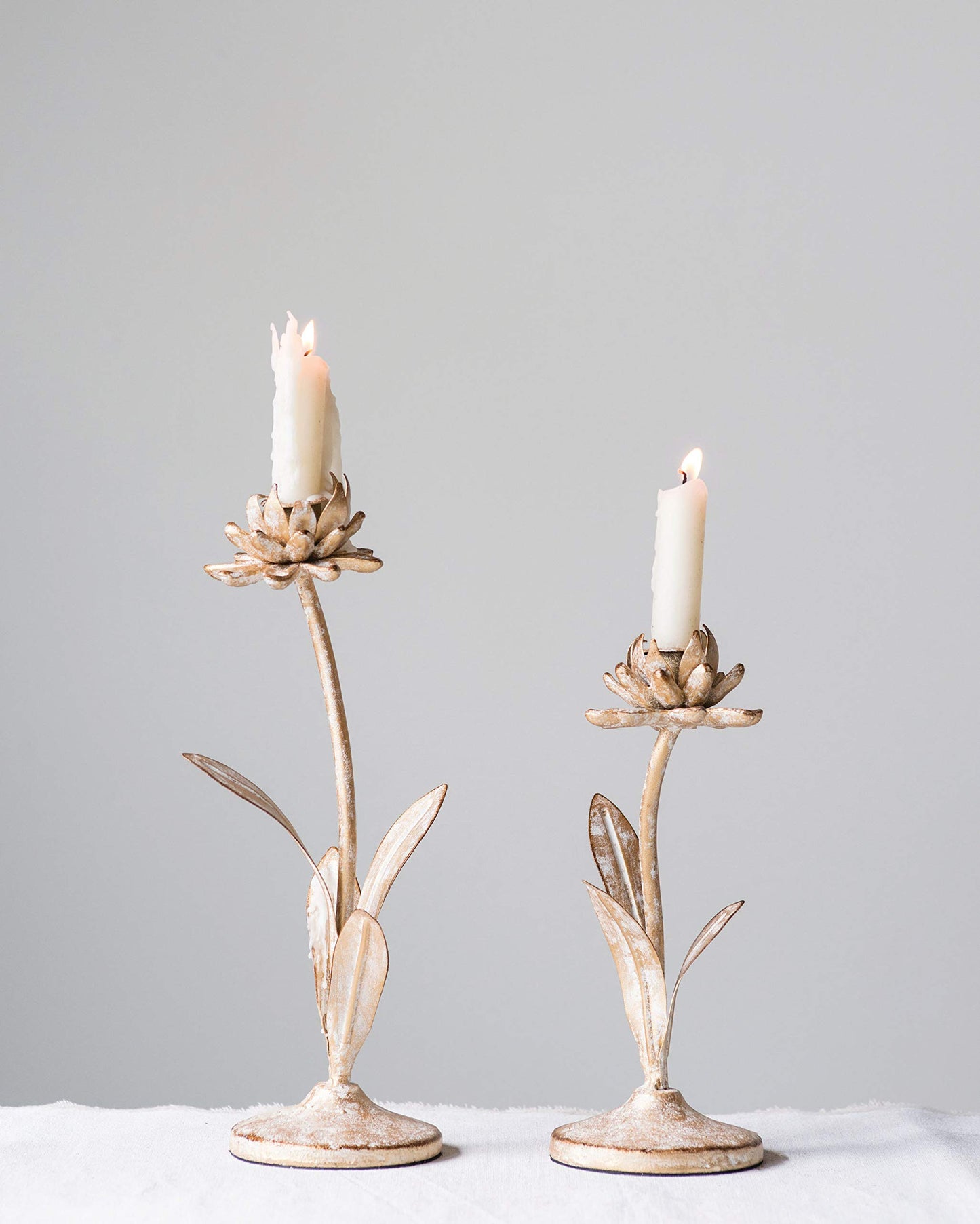 Creative Co-Op Cut Metal Flower Shaped Taper Candle Holder in Distressed Gold Finish (Set of 2 Sizes)