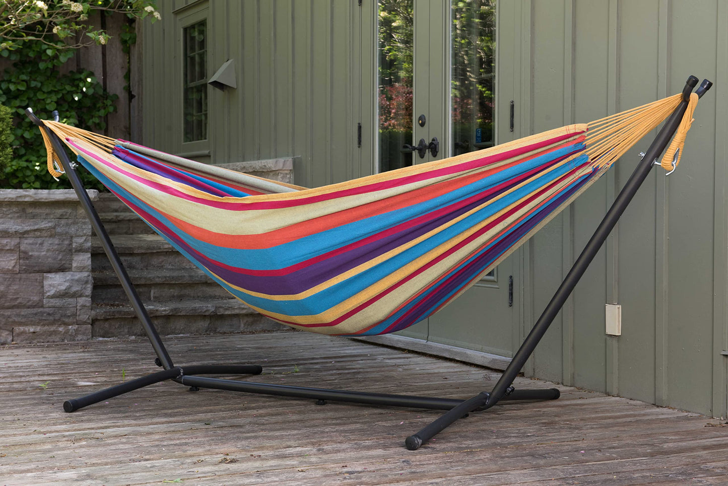 Vivere Double Cotton Hammock with Space Saving Steel Stand, Tropical (450 lb Capacity - Premium Carry Bag Included)